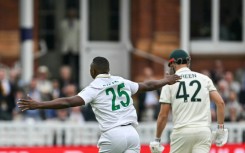 South Africa's Kagiso Rabada celebrates taking the wicket of Australia's Cameron Green on the first morning of the World Test Championship final at Lord's