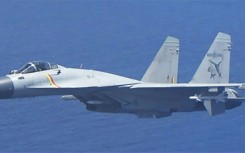 China and Japan traded barbs after a Chinese J-15 fighter jet followed a Japanese patrol plane at the weekend