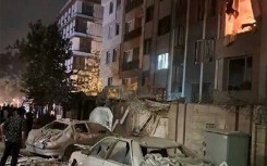 This handout photo released by Iran's Revolutionary Guard Corps (IRGC) official Sepah News Telegram channel on June 13, 2025 reportedly shows a building in Tehran hit in an Israeli strike
