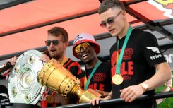 Florian Wirtz (right) inspired Leverkusen to a German league and cup double in 2023/24