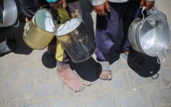 Thousands of Gazan children queue every day at community kitchens in the hope of securing food for their families