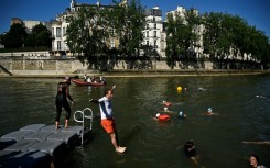 Flags will inform bathers about pollution levels in the water, particularly "on days following heavy rainfall," said Paris city official Pierre Rabadan.