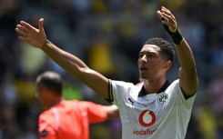 Borussia Dortmund's English midfielder Jobe Bellingham celebrates scoring his team's third goal against the Sundowns