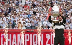 Spain's Carlos Alcaraz celebrates his second Queen's Club title before Wimbledon