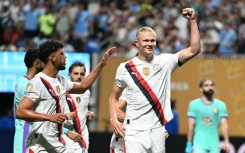 Manchester City striker Erling Haaland celebrates after tucking away his penalty