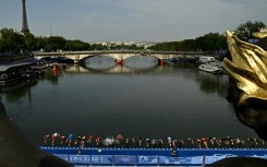 Olympic triathletes dive into the Seine last summer