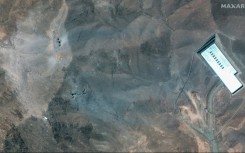 This handout satellite picture provided by Maxar Technologies and taken on June 22, 2025, shows a close-up view of craters after US strikes on Iran's Fordo Fuel Enrichment Plant (FFEP), northeast of the city of Qom