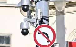 Newly installed cameras have appeared on lamp posts along the planned route of the march