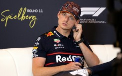 Red Bull's Max Verstappen remained tight-lipped on speculation linking him to a potentially explosive move to Mercedes