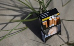 France will ban smoking on beaches and in parks, public gardens and bus shelters from Sunday, the government said