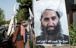 A poster of Taliban Supreme Leader Hibatullah Akhundzada along a road in Kabul