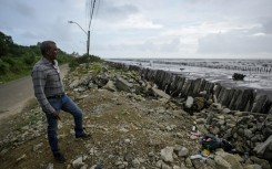 Professor Sieuwnath Naipal, a researcher at Anton de Kom University specializing in climate change and water management, led the mangrove restoration effort