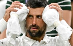 Serbia's Novak Djokovic kept his cool during his first-round win at Wimbledon