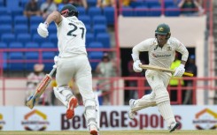 Beau Webster (L) and Alex Carey (R) rebuilt Australia's first innings after a top-order wobble in Grenada