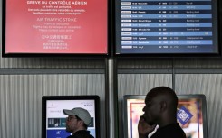 Passengers looked anxiouisly at departure boards
