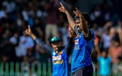 Sri Lanka's Asitha Fernando celebrates after taking the wicket of Bangladesh's Shamim Hossain
