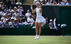 Germany's Laura Siegemund celebrates after beating Madison Keys at Wimbledon