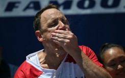 American Joey Chestnut won the men's title at the 2025 Nathan's Famous Fourth of July hot dog eating competition at Coney Island
