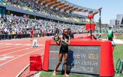 Kenya's Beatrice Chebet wins the 5,000m in a world record of 13:58.06 at the Eugene Diamond League athletics meeting
