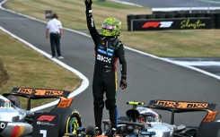 Lando Norris celebrates winning his home British Grand Prix