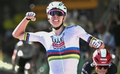 Tadej Pogacar celebrates victory in Rouen, his 18th in the Tour de France and his 100th as a pro