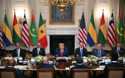US President Donald Trump (C) speaks during a multilateral lunch with visiting African leaders at the White House