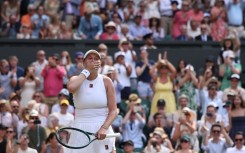 Amanda Anisimova celebrates reaching the Wimbledon final