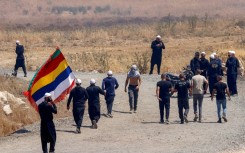 Members of the Druze community from both sides cross the demilitarised zone between Syria and the Israeli-annexed Golan Heights