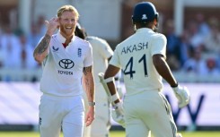 England captain Ben Stokes (L) gestures to India's Akash Deep
