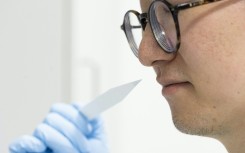 Junior perfumer Shangyun Lyu with a smell strip