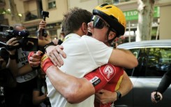 Norwegian rider Jonas Abrahamsen celebrates after winning the 11th stage of the Tour de France