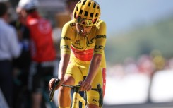 After two days in yellow Irishman Ben Healy gave up the overall lead of the Tour de France after a punishing stage 12 left him over 13 minutes off the pace