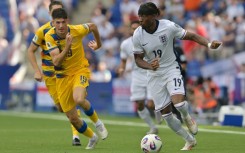 Arsenal have signed England winger Noni Madueke (R) from Chelsea