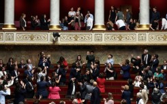 Several left-wing parties and environmental associations have urged Macron to demand a 'new deliberation' of the legislation in parliament