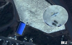 This handout satellite image taken on December 9, 2021 by Planet Labs PBC shows what Dutch peace organisation PAX says is a Turkish Bayrakter TB-2 drone parked outside a hangar at the northern part of Hara Meda air base in Bishoftu, Ethiopia