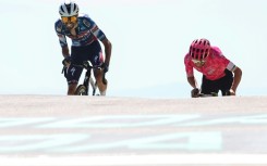 French rider Valentin Paret-Peintre (L) pipped Irish rider Ben Healy to the top of Mont Ventoux
