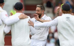 England captain Ben Stokes (L) celebrates after scoring a century in the fourth Test against India at Old Trafford