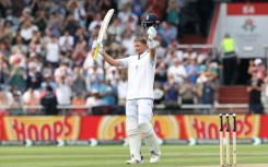 England's Joe Root celebrates his century in the fourth Test against India at Old Trafford