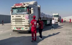 Aid trucks have begun crossing into Gaza from Egypt, but aid agencies warn that without a ceasefire, large-scale operations will be impossible