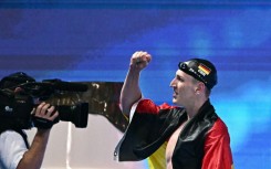 Germany's swimmer Lukas Maertens celebrates after winning the final of the men's 400m freestyle