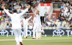 England captain Ben Stokes (C) celebrates with team-mates after dismissing India's KL Rahul in the fourth Test at Old Trafford