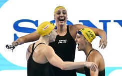 Australia celebrate winning the final of the women's 4x100m freestyle relay