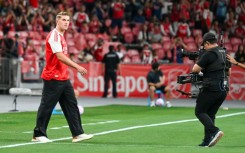 Viktor Gyokeres walks on the field before the match against Newcastle in Singapore