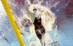Katie Ledecky competes in a heat of the women's 1500m freestyle swimming event during the 2025 World Aquatics Championships in Singapore