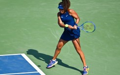 Naomi Osaka of Japan won a first-round match at the WTA Canadian Open after a split with coach Patrick Mouratoglou