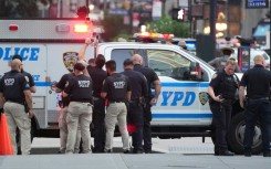 New York City police officers deployed a drone near Park Avenue at the height of the afternoon rush-hour as they investigated a possible active shooter situation