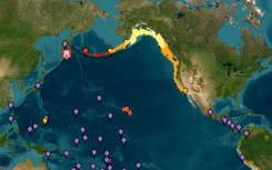 This image courtesy of the National Oceanic and Atmospheric Administration's Tsunami Warning System shows tsunami warnings (red), advisories (orange) watches (yellow) and threats (purple) after an 8.7 earthquake hit off of Russia's far east
