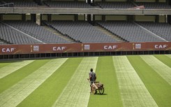 A groundkeeper puts the finishing touches to the pitch in Nairobi ahead of the African Nations Championship