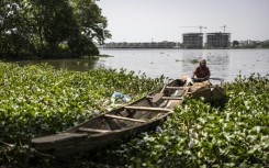 Sat in his pirogue on Jabi lake in Abuja this local fisherman, like his peers, has a mixed relationship with the city