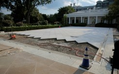 Under Trump's direction, to the White House Rose Garden lawn has been paved over